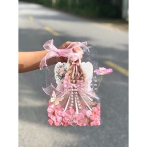 Túi lịch cô gái có ống tiên cắm sẵn hoa